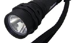 Tactical Gear LED FlashlightThis 80 lumen flashlight features an intense beam of light that projects a tight spot of 100 feet. The 80 Lumen Tactical Gear Flashlight is constructed of hard anodized aluminum and has a recessed tail cap push button switch,