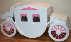 We are proud to present this exquisitely handcrafted Carriage Toy Box Hope Chest, shown here in a beautiful shade of bright white with stunning pink accents. This Toy Box Hope Chest is completely handcrafted by highly skilled artisans from start to